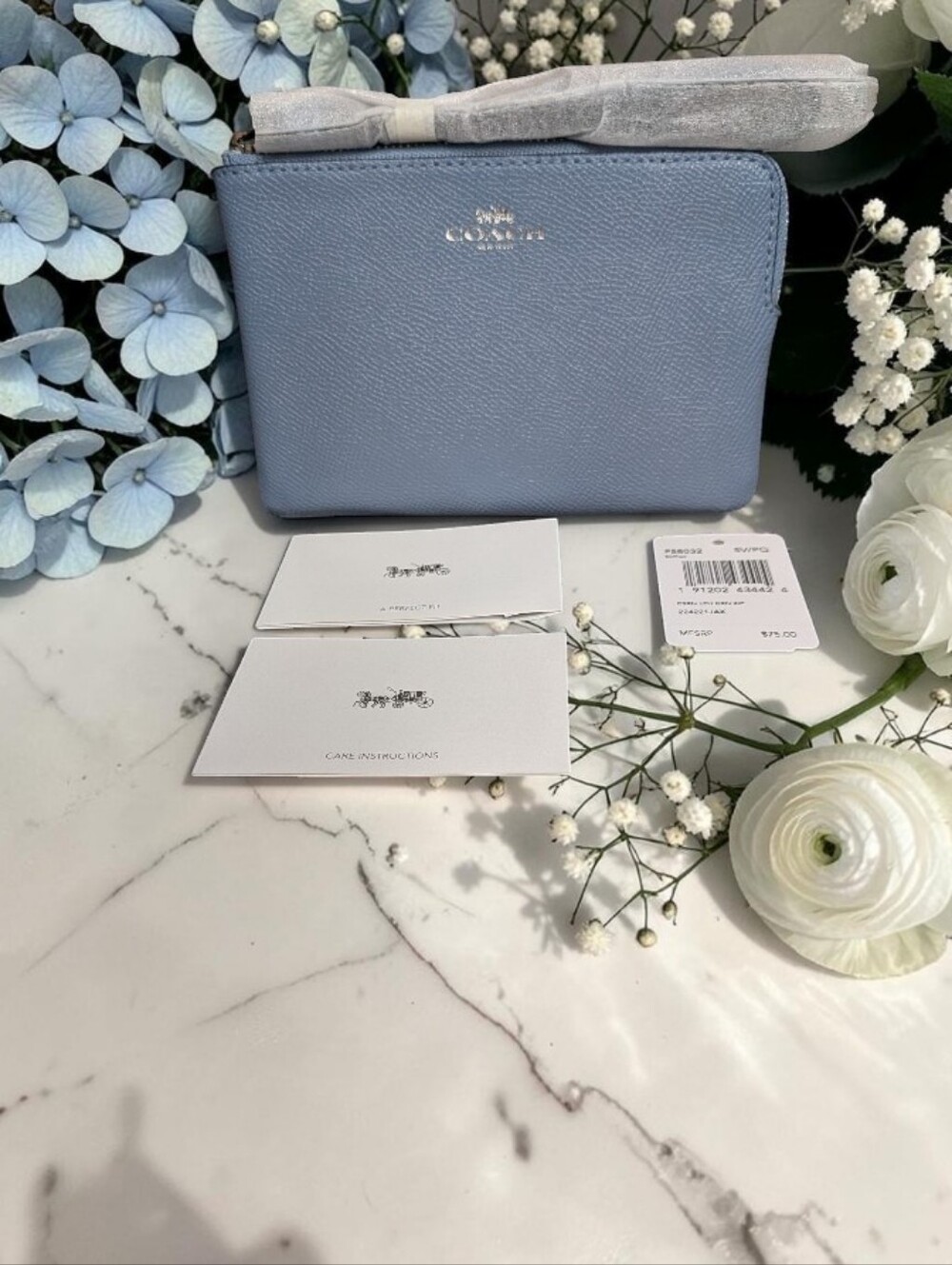 NWT Coach Powder Blue Pebbled Leather Zip Wristlet